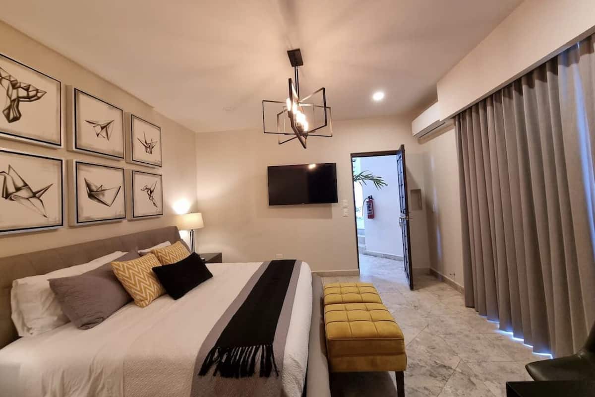 Design Studio Suite | Premium bedding, down duvets, desk, laptop workspace