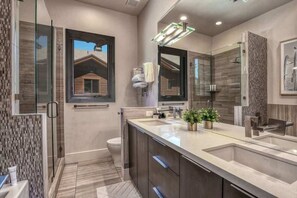 Bathtub, hair dryer, shampoo