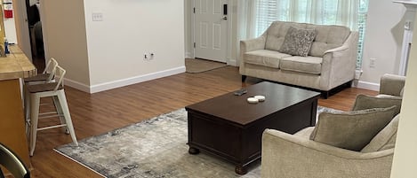 Smart TV, fireplace, books, stereo