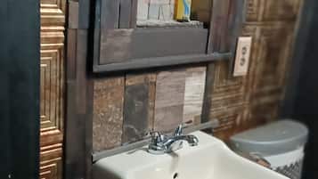 Combined shower/tub, hair dryer, towels, soap