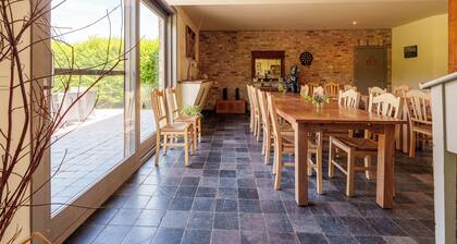 Family house on a farm by the sea