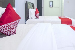 Desk, laptop workspace, free WiFi, bed sheets