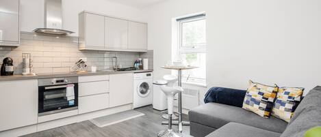 Apartment | Living area | 30-inch TV with digital channels