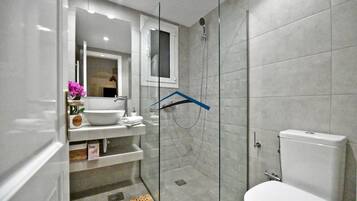 Hair dryer, towels, soap, shampoo