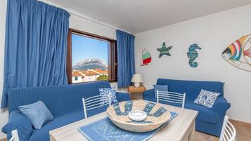 21-inch flat-screen TV with cable channels, TV