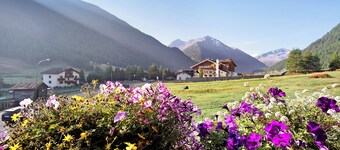 Apartamento vacacional 'Stelle Chalet Martina' cerca de las pistas de esquí con jardín y Wi-Fi