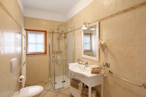 Shower, free toiletries, hair dryer, towels