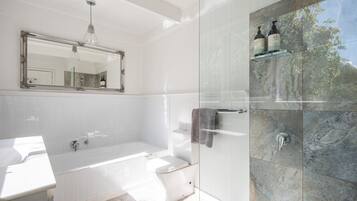 Bathtub, hair dryer, towels