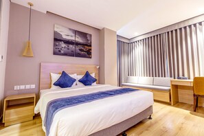 Standard Room, 1 King Bed | Egyptian cotton sheets, premium bedding, minibar, in-room safe - Kovie Hotel (Hai Phong)