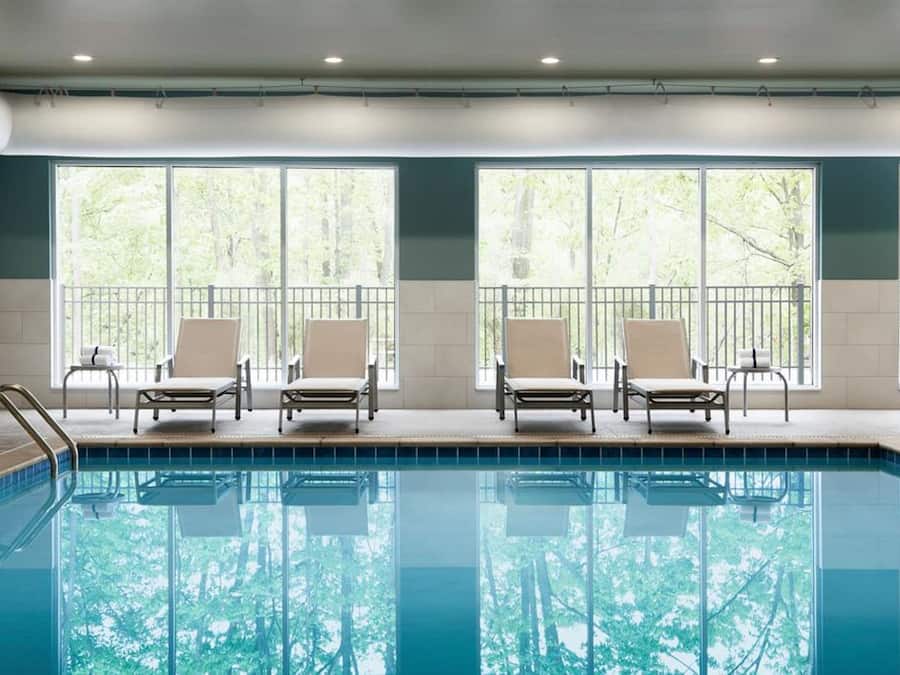 Indoor pool, open 8:00 AM to 10:00 PM, sun loungers