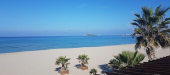 Villa Butterfly1 with a veranda and outdoor shower by the sea and cultural sites