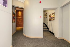 100-inch Smart TV with cable channels, books - La Pera Suites (Istanbul)