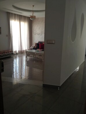 Apartment, 2 Bedrooms, Smoking, Balcony | Living room | Books - 1 km From Mansoura Kélibia Beach (Kelibia)