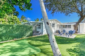 Expansive backyard features a putt-putt golf course