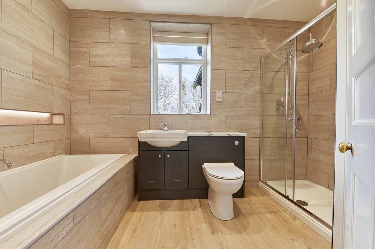 Shower, hair dryer, towels, shampoo
