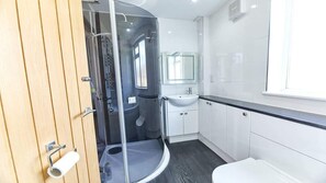 Bathtub, hair dryer, towels