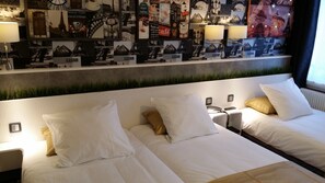 Classic-Dreibettzimmer | Hochwertige Bettwaren, individuell dekoriert