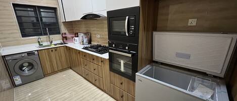 Fridge, microwave, oven, electric kettle