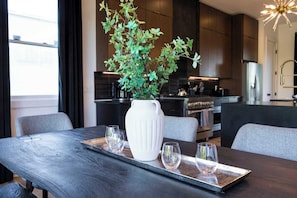 Fridge, stovetop, dishwasher, coffee/tea maker