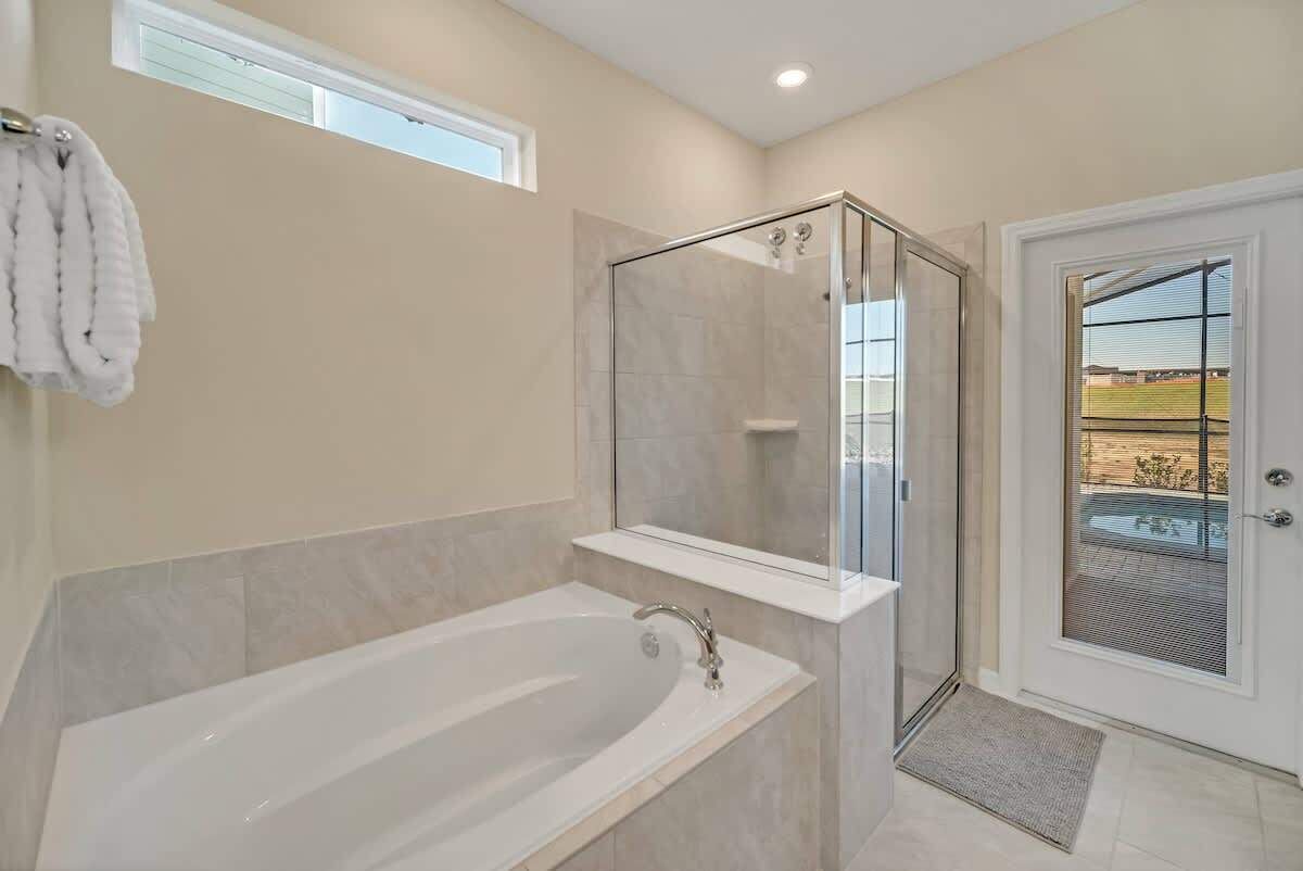 Combined shower/tub, hair dryer, towels, soap