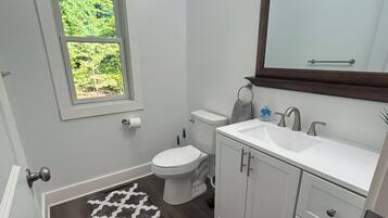 Combined shower/tub, hair dryer, towels, soap