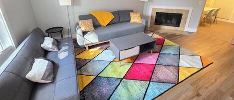 Smart TV, fireplace, books