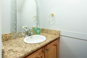 Combined shower/tub, hair dryer, towels, soap