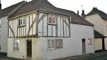 A traditional half-timbered building with a sign reading 'SHORT STREET.'