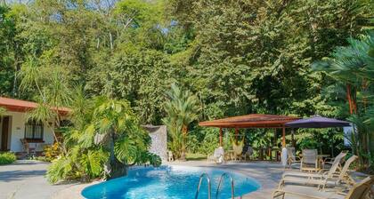 Private suite 102 with beautiful gardens, shared pool and BBQ area!