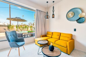 Suite Deluxe, piscine privée | Coin séjour