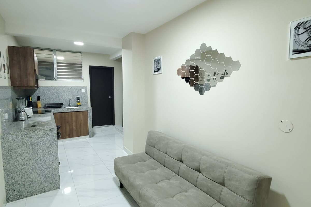 Comfort Apartment, 1 Bedroom | Living area | Smart TV, streaming services