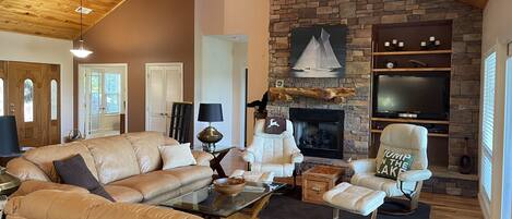 Smart TV, fireplace, DVD player, books