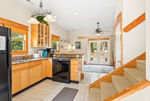 Fridge, microwave, oven, stovetop - 1BR historic cottage w/ fireplace, patio & tub (Manteo)