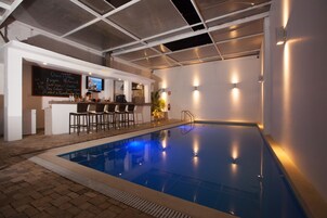 Outdoor pool, open 10:00 AM to 10:00 PM, sun loungers