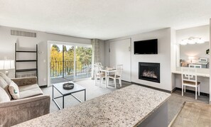 TV, fireplace - "View and Far Between" Second-floor - Riverfront Condo Near Downtown Bend (Bend)