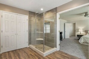 Bathtub, hair dryer, towels, soap