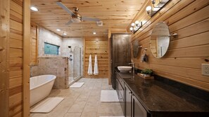 Bathtub, hair dryer, towels, soap