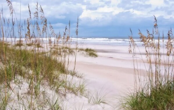 On the beach, sun loungers