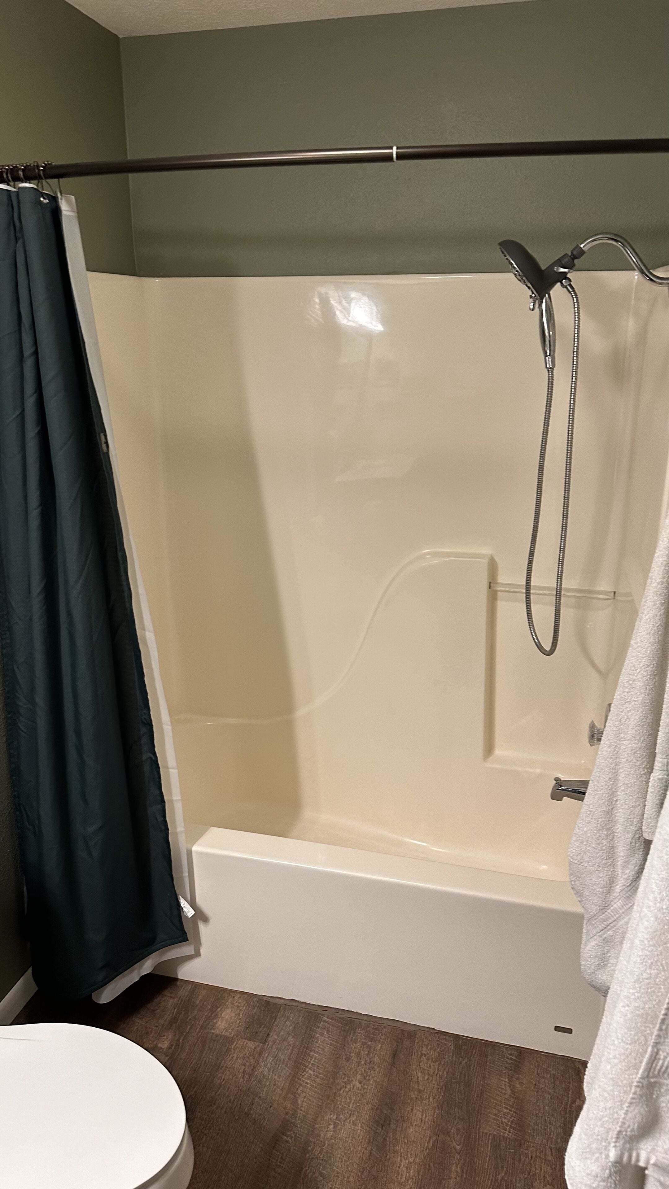 Combined shower/tub, hair dryer, towels, soap