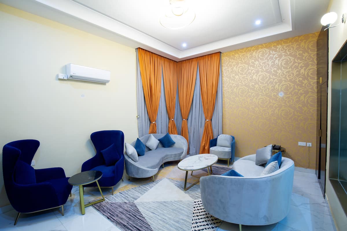 Presidential Triple Room | Living area | LED TV, fireplace, Netflix, streaming services