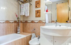 Bathtub, hair dryer