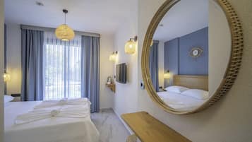 Habitación estándar | Ropa de cama de alta calidad, minibar, caja fuerte y cortinas opacas