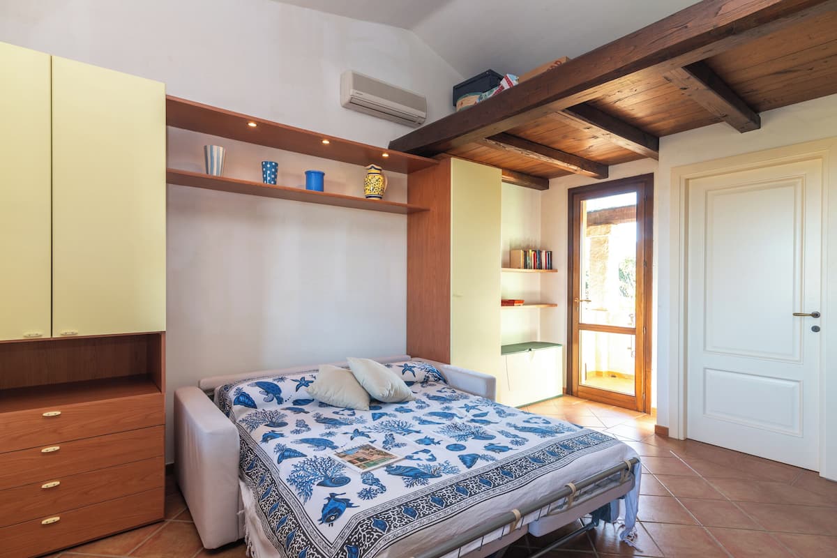 Estúdio família (Il Borgo 14/11 700m From The Beach) | 1 quarto, roupa de cama