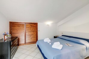 Family Apartment, Multiple Bedrooms (Il Borgo 2/15 700m From The Beach) | 1 bedroom, bed sheets - Il Borgo 2/15 700m From The Beach (Loiri Porto San Paolo)