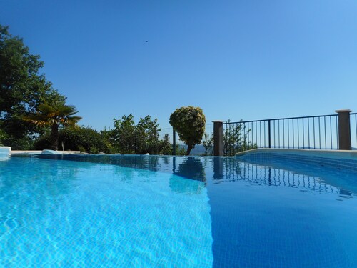 Villa with a heated pool and panoramic views, not overlooked.