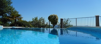 Villa with a heated pool and panoramic views, not overlooked.