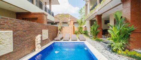 Outdoor pool, sun loungers