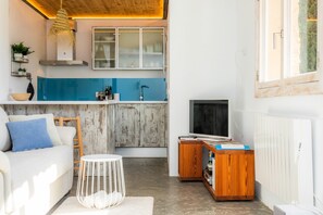 TV, fireplace - Country House 'Finca Es Canyaret' with Mountain View, Pool & Garden (Capdepera)