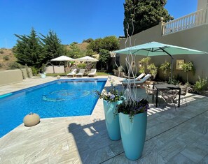 Outdoor pool, a heated pool -  Unbeatable Sea and Mountain Views in a stylish and authentic location (AN)