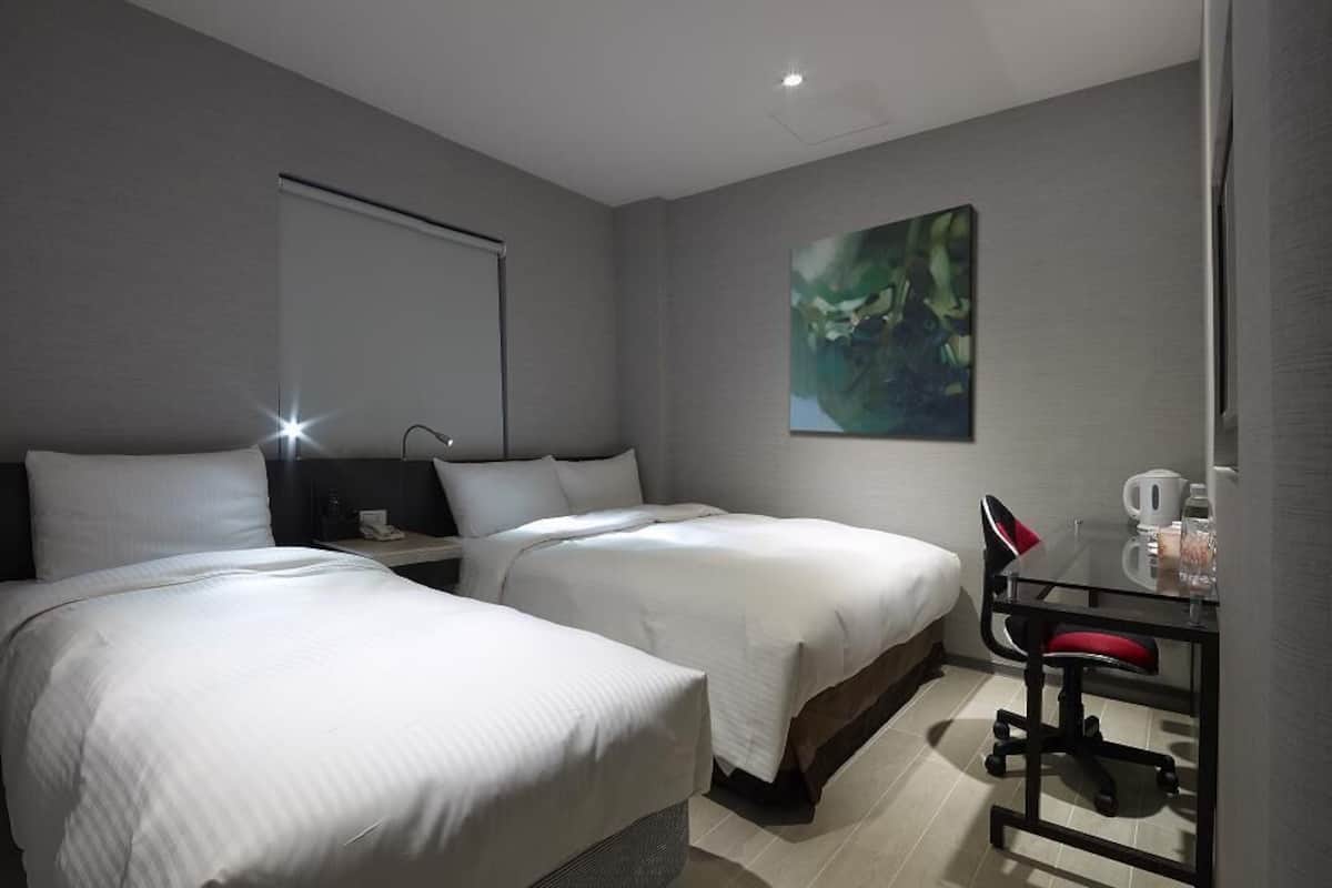 Desk, laptop workspace, free WiFi, bed sheets